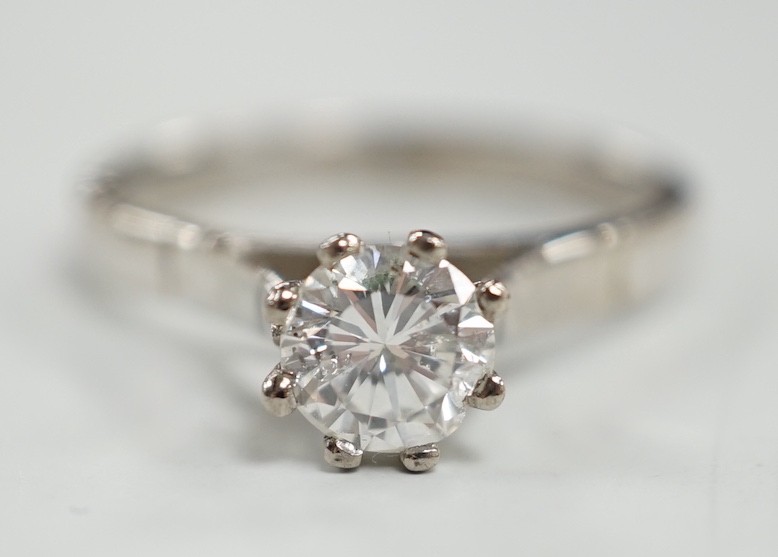 An 18ct white metal and solitaire diamond set ring, size Q, gross weight 4.6 grams, the stone measuring 6.3mm in diameter.